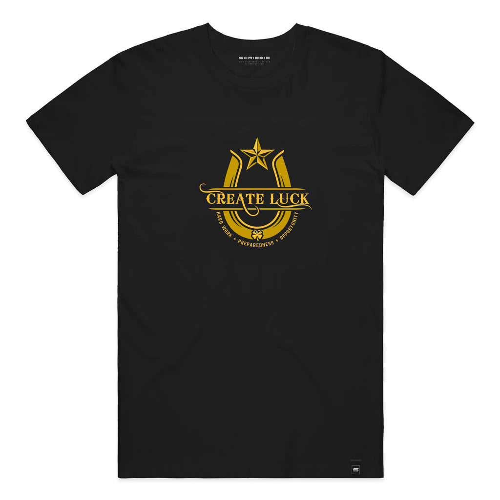 A black short-sleeve crewneck t-shirt featuring a gold graphic on the chest with a star, horseshoe, and the text 'CREATE LUCK'.